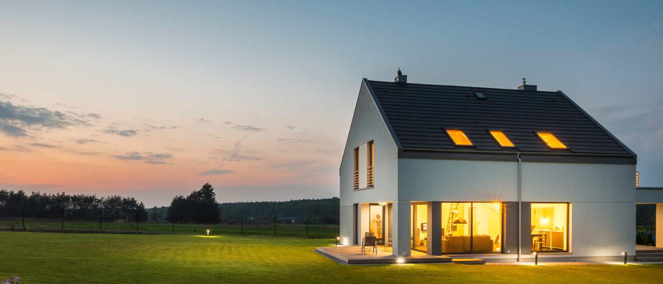 modern house with garden at night